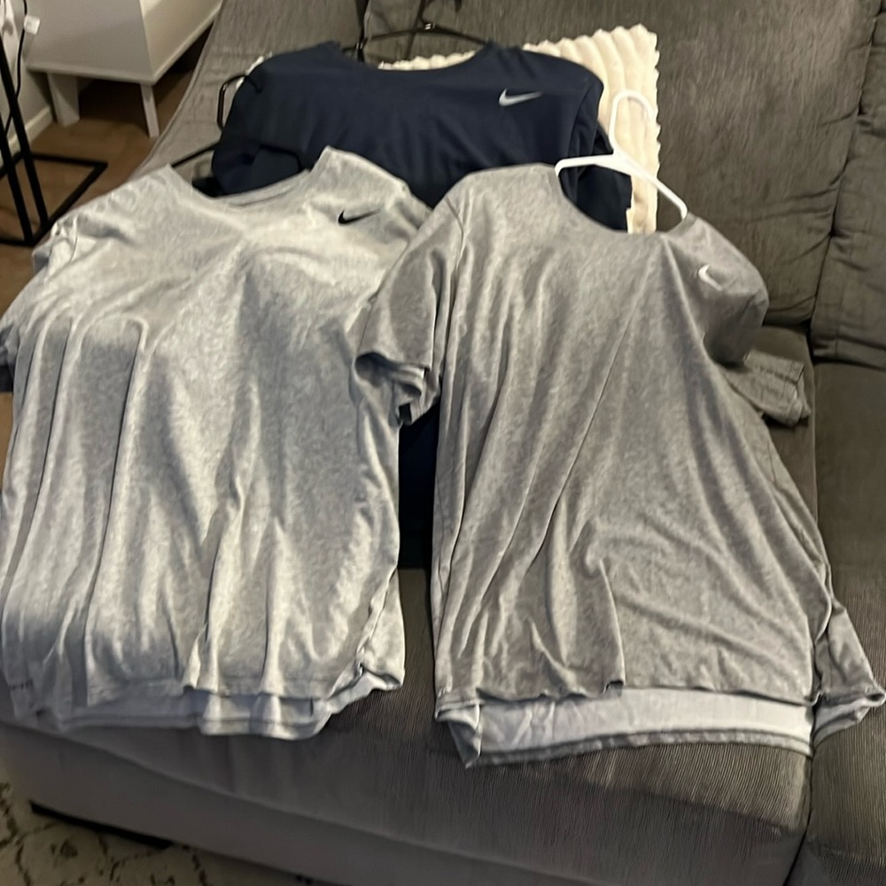 Three Nike dry-fit tees